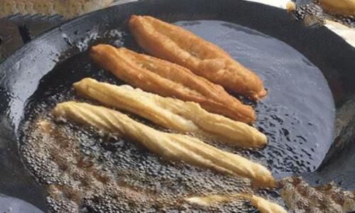 中国美食“油条”是怎么来的?他背后的故事又是什么? 中国美食“油条”是怎么来的?他背后的故事又是什么?